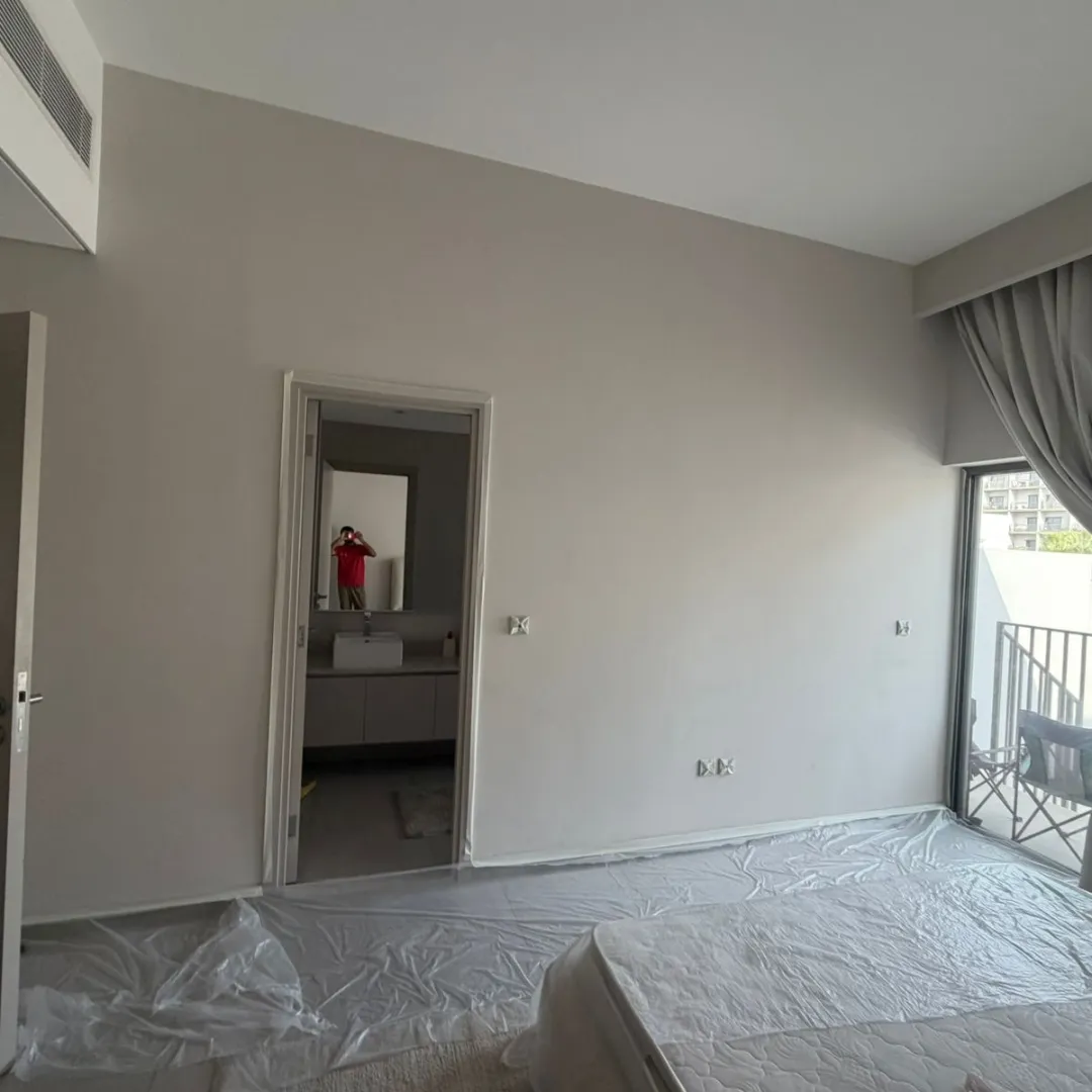 Room repainted in beige by Hilal Al Fajar in Dubai